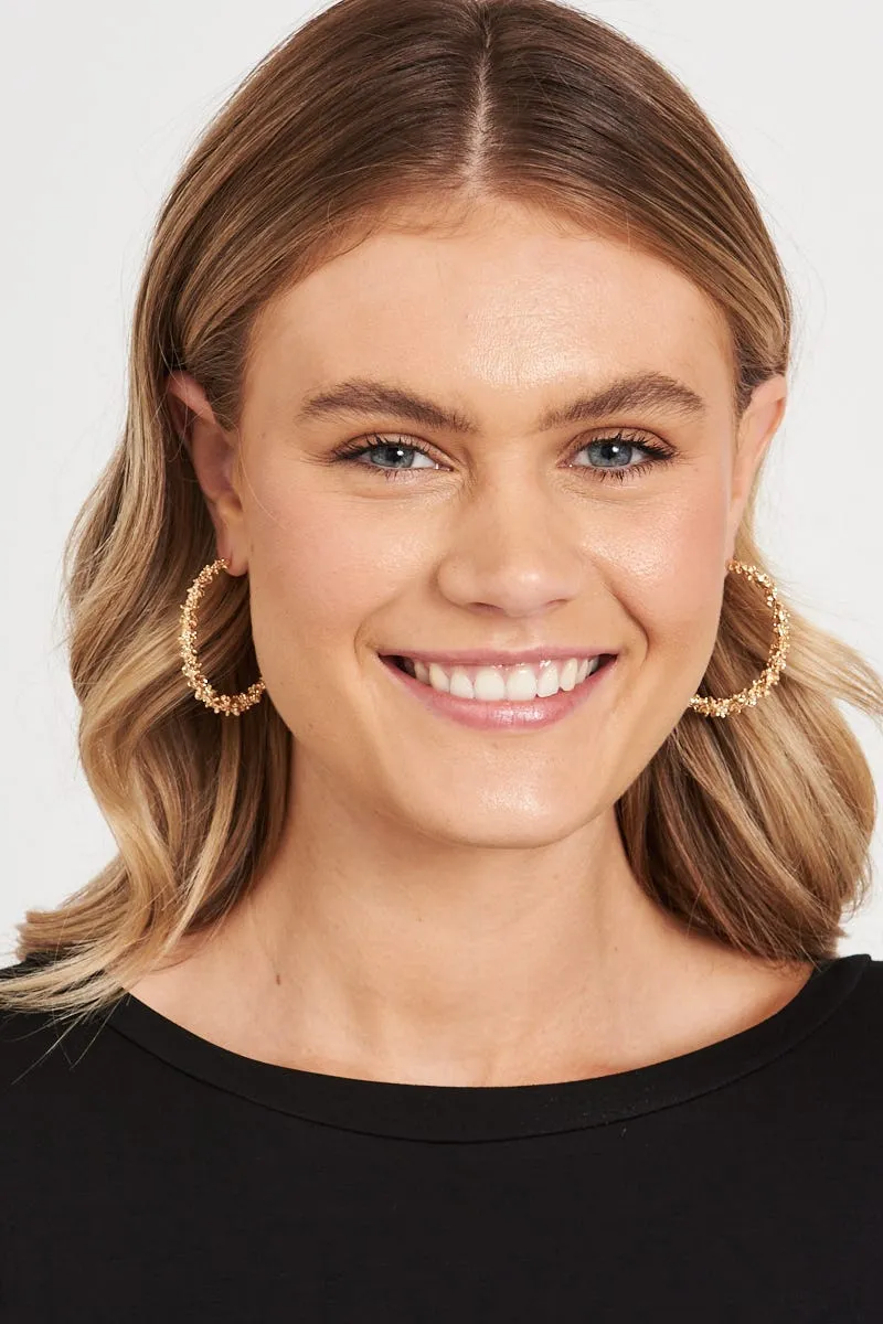 August   Delilah Sable Gold Textured Hoop Earrings
